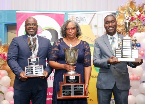 Dorette Rhoden Henry, teacher of deCarteret College and the 2025 LASCO, Ministry of Education, Skills, Youth and Information, Jamaica Teaching Council Teacher of the Year, with Orville Anthony Richards (left), principal of St Mary Technical High School, an