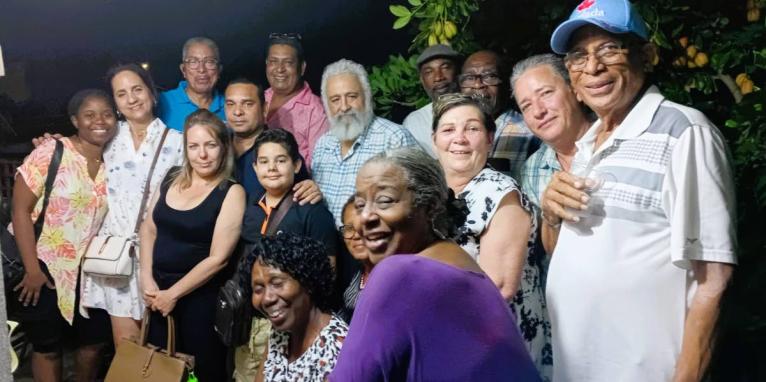 A group of Cubans doctors pose for a photo at a farewell get-together.