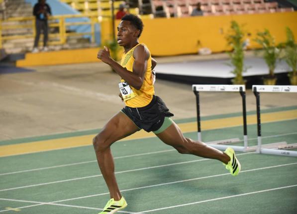
Excelsior High School’s Jaeden Campbell in action in the Boys’ Class 2 400-metre hurdles at the ISSA/GracKennedy Boys and Girls’ Athletics Championships inside the National Stadium.