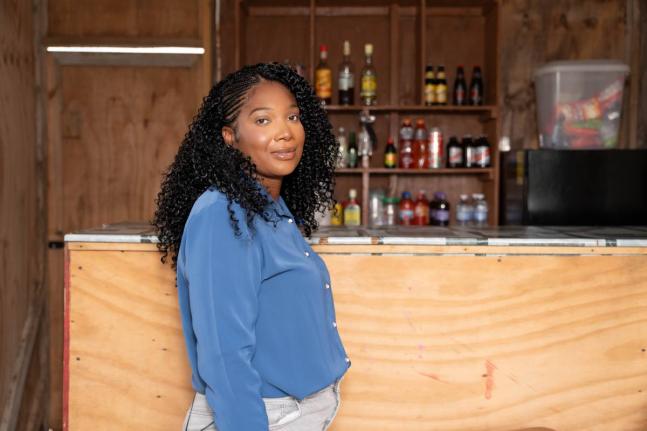 Nekesha Hines-Brown in her shop, which was impacted by Hurricane Melissa.
