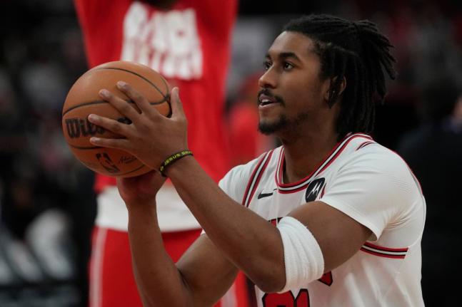  Chicago Bulls guard Jaden Ivey warms up before an NBA basketball game against the Toronto Raptors on February 19, 2026, in Chicago. (AP Photo/Erin Hooley, File)