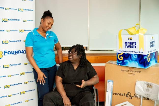 Kadeen Finn-Miller (left), programmes administrator at the NCB Foundation, listens keenly as Bridgette Small, a registered nurse and Grant a Wish beneficiary, shares a reflective moment at the recently held handover.
