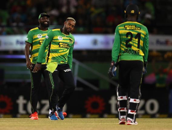 Fabian Allen (centre) of Jamaica Tallawahs celebrates after getting the wicket of Roston Chase of St Lucia Kings during the Republic Bank Caribbean Premier League T20 eliminator match at Providence Stadium in Georgetown, Guyana, on September 19, 2023.