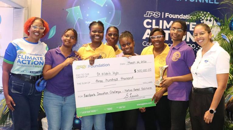 The winning St Hilda’s team with JPS Foundation head, Sophia Lewis (left), and EFJ CEO Nicole Adamson (right).