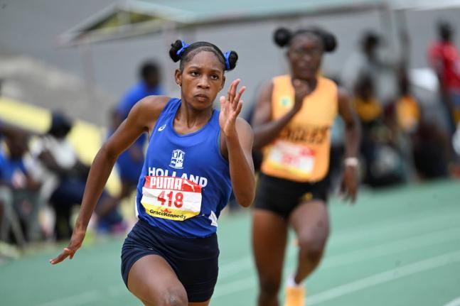 Shanoya Dougas of Holland High School on her way to winning the Girls’ Class One 200 metres at the ISSA/GraceKennedy Boys and Girls’ Athletics Championships.