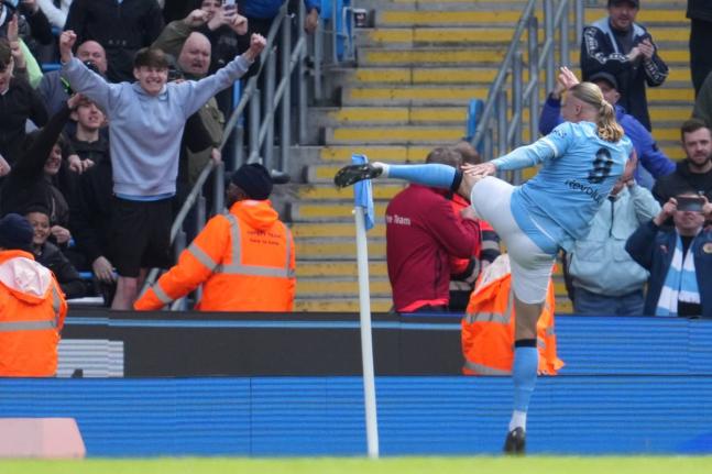 AP 
Manchester City’s Erling Haaland celebrates after scoring during the FA Cup quarter-final football match against Liverpool in Manchester, England, yesterday.