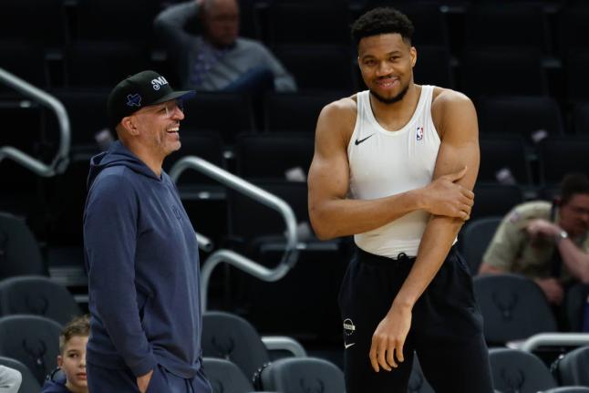 Milwaukee Bucks forward Giannis Antetokounmpo (right)  talks to the Dallas Mavericks head coach Jason Kidd before an NBA basketball game Tuesday, March 31, 2026, in Milwaukee. 