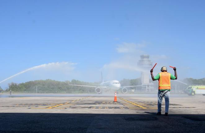 Aircraft marshaller at Sangster International Airport in Montego Bay, St James, on Friday, February 24. 