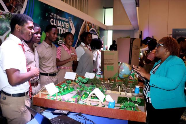 Students show off their project at the recent JPS Foundation Climate Action Conference and Expo held in Kingston.