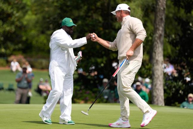 Actor Kevin Hart (left) celebrates with Bryson DeChambeau on the third hole during Augusta National’s Par-3 Contest ahead of the Masters golf tournament at the Augusta National Golf Club in Augusta, Georgia, yesterday.