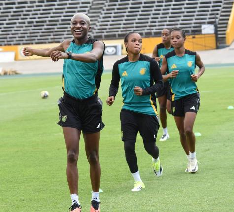 Members of the Reggae Girlz squad go through their paces during their a training session at the National Stadium yesterday ahead of today’s Concacaf World Cup qualifying match against Antgua and Barbuda. The match kicks off at 7 p.m.