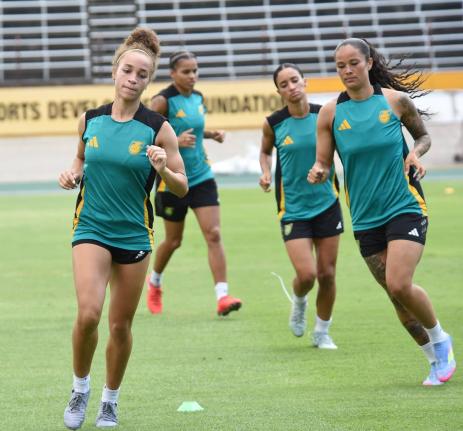 Members of the Reggae Girlz squad go through their paces for their upcoming game against Antigua and Barbuda on Friday.