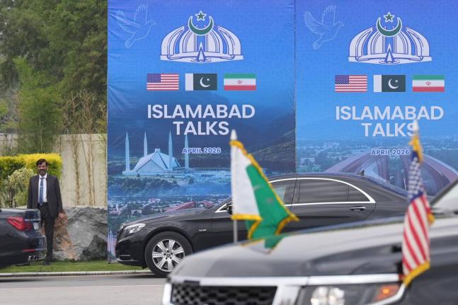 A Pakistani official is seen during the arrival of the US Vice President JD Vance for talks with Iranian officials in Islamabad.