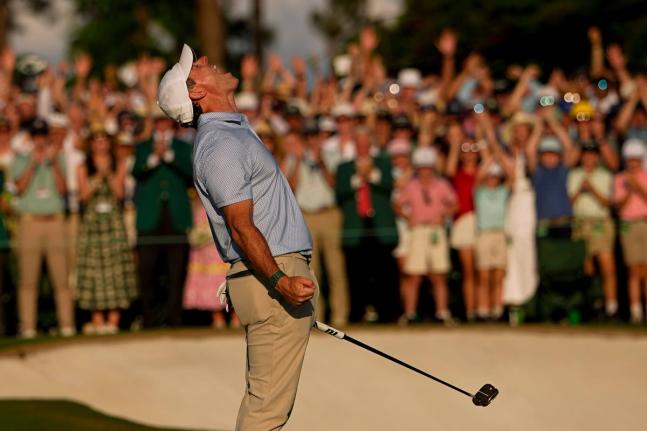 Rory McIlroy of Northern Ireland celebrates after winning the Masters golf tournament at the Augusta National Golf Club yesterday.
