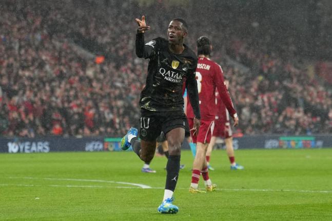 PSG’s Ousmane Dembele celebrates after scoring during the Champions League quarter-final second leg football match against Liverpool at Anfield in Liverpool, England, yesterday.