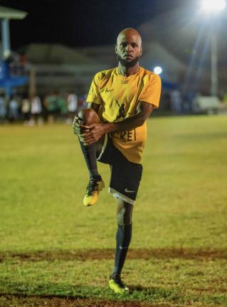 Jermaine  Fletcher, captain of the Pocket Rocket Foundation  All-Star team, warms up ahead of their second match against the Awesome Sports All-Star team in St Vincent and the Grenadines on Sunday April 12.
