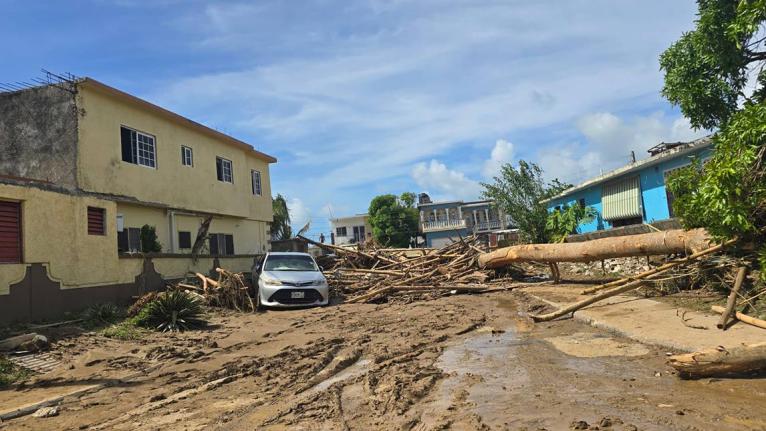Thick mud blocks the entrances to homes in Westgreen, Montego Bay, St James, following the passage of Hurricane Melissa. 