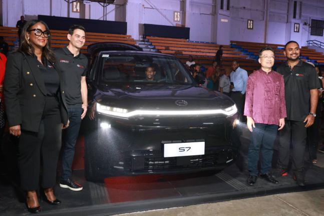 The future of driving has arrived. Marking the official debut of the GAC S7 in Jamaica, key industry leaders gather for a landmark unveiling. Pictured (L-R): Deborah Stewart - General Manager, Fidelity Motors; Alan Bayne - CEO, GEL Auto Division; His Excel