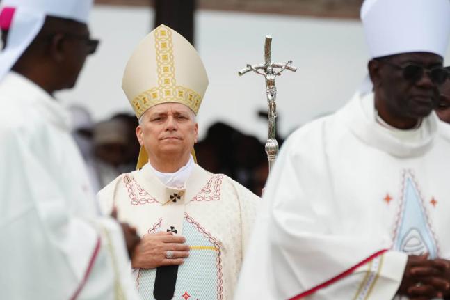Pope Leo XIV arrives in procession to celebrate Mass at Yaounde Ville Airport, Cameroon.