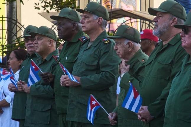 Cuban President Miguel Diaz-Canel (centre) attends a celebration marking the 65th anniversary of the proclamation declaring the Cuban Revolution socialist, in Havana, Cuba, on April 16.