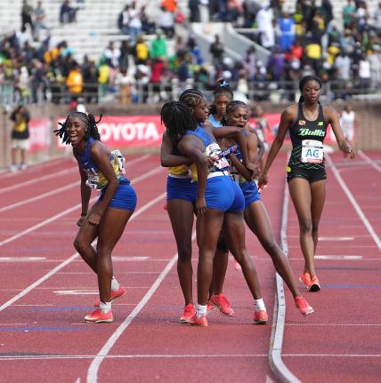 Hydel High School’s athletes celebrate winning the final event of the Penn Relays, the Championship of America 4x400-metres inside Franklin Field Stadium in Philadelphia, Pennsylvania on Saturday, April 26, 2025.