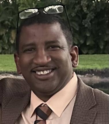 Kurt F. Robertson, Ph.D. in International Relations and Comparative Politics from Howard University.