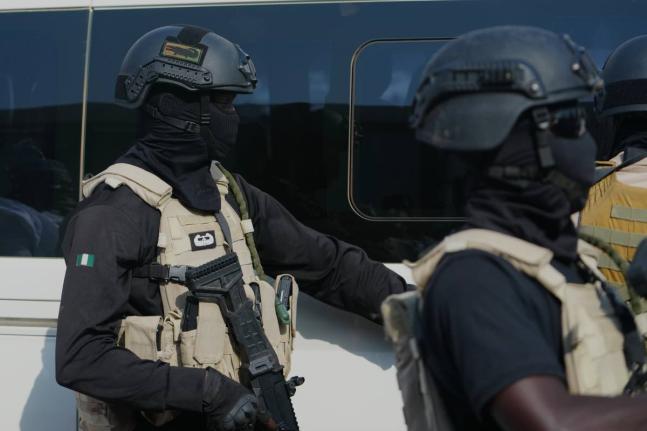Members of the Nigerian army provide security during an event in Minna, Nigeria, December 22, 2025. (AP Photo/Sunday Alamba, File)
