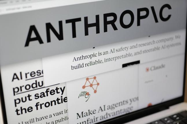 Pages from the Anthropic website and the company’s logo are displayed on a computer screen in New York, USA, on February 26, 2026. 