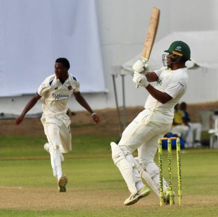 Jamaica Scorpions batsman Brad Barnes plays a hook shot against Barbados Pride pacer Johann Layne during their drawn West Indies Championship game at Sabina Park yesterday.