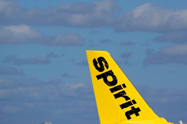 FILE - The tail of a Spirit Airlines Airbus A320 is shown as the plane prepares to take off from Fort Lauderdale-Hollywood International Airport, January 19, 2021, in Fort Lauderdale, Florida. (AP Photo/Wilfredo Lee, File)