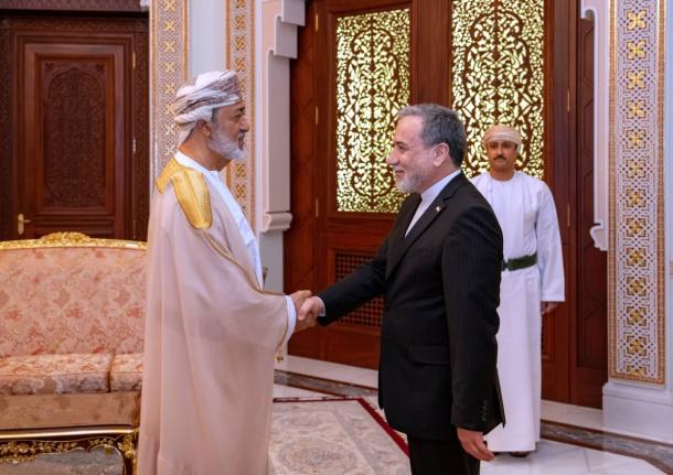 In this photo released by the Iranian Foreign Ministry, Iranian Foreign Minister Abbas Araghchi, right, shakes hands with Oman's Sultan Haitham bin Tariq during their meeting, in Muscat, Oman on April 26, 2026. (Iranian Foreign Ministry via AP)
