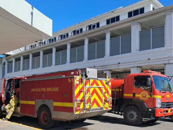 Firefighters responding to a small fire at the Supreme Court building in downtown Kingston on April 27, 2026