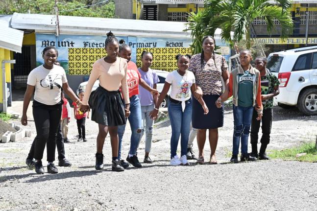Nicola McCarthy (third right), grade-six teacher with her students back in school at the Mount Fletcher Primary in Mavis Bank, rural St Andrew, last November after Hurricane Melissa.