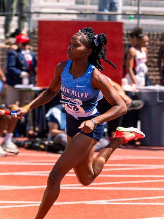 An Edwin Allen athlete competes in the Championship of America 4x100 metres at the Penn Relays inside the Franklin Field stadium in Philadelphia last week.