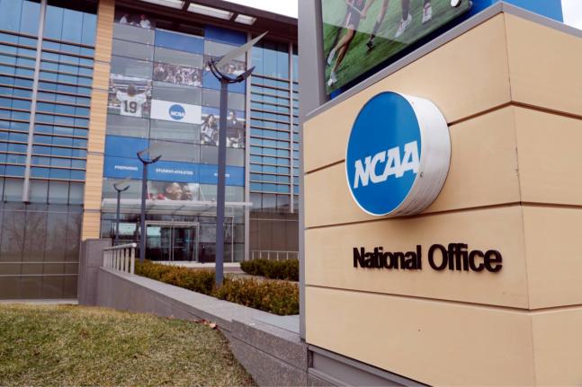 FILE - This March 12, 2020, file photo, shows the national office of the NCAA in Indianapolis. (AP Photo/Michael Conroy, File)