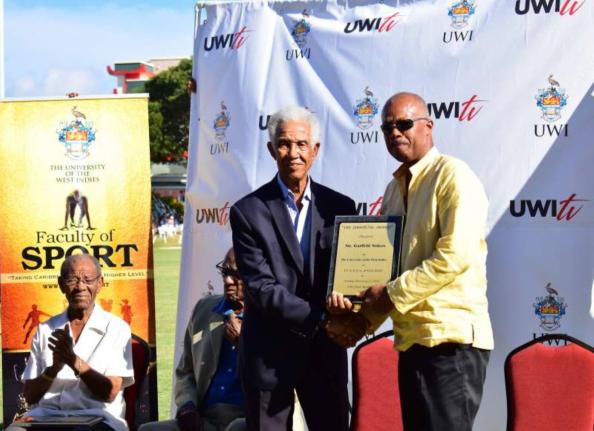 In this February 17, 2019, photo, Sir Garfield Sobers (left) is honoured as a UWI Vice-Chancellor’s XI ‘Immortal’ by Vice-Chancellor Professor Sir Hilary Beckles. - UWI Photo Archives