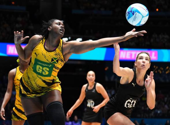 Romelda Aiken-George (left) of Jamaica in action during the Netball Gold Medal match between Jamaica and New Zealand, on day ten of the 2026 Commonwealth Games in Glasgow, Scotland yesterday.