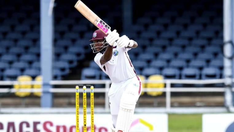 Justin Greaves drives through the offside during his unbeaten half-century against Pakistan on the opening day of the second cricket Test at Queen’s Park Oval in Trinidad on Sunday.
