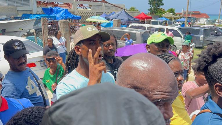 A concerned resident questions Prime Minister Dr Andrew Holness about not receiving a ROOFS grant despite registering for the programme.