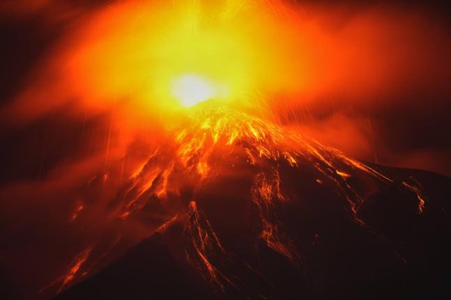 Lava flows out of the crater of the Fuego volcano, as seen from San Juan Alotenango, Guatemala,  onTuesday. 