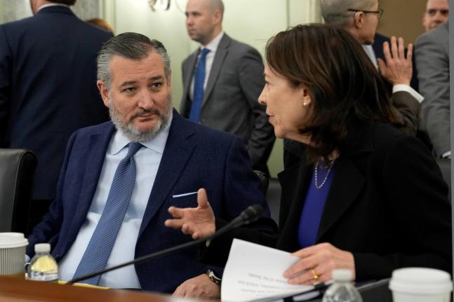 AP 
Senate Commerce, Science, and Transportation Committee Chair Senator Ted Cruz (left) talks with ranking member Senator Maria Cantwell before the start of a hearing on Capitol Hill in Washington, Wednesday, January 15, 2025. 