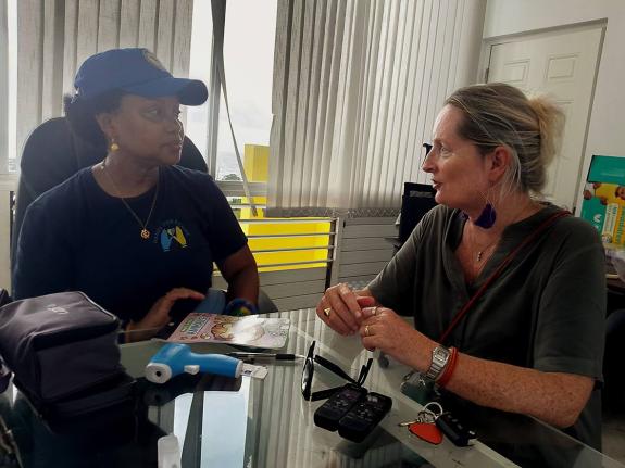 Dr Kijana Nix (left), head of the Hands for a Cause medical mission, and Katrin Casserly, chairperson of Hanover Charities, discuss the four-day free health clinic held in Hanover.