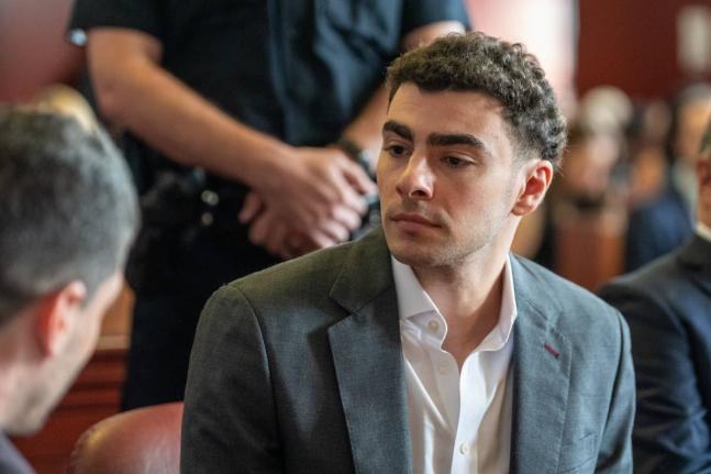 Luigi Mangione appears for a pre-trial hearing at Manhattan Criminal Court in New York, on Tuesday, Aug. 11, 2026. (David Dee Delgado/Pool Photo via AP)