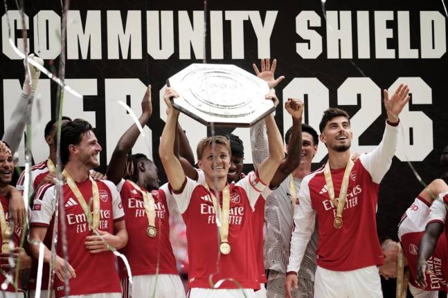 Arsenal’s Martin Odegaard lifts the trophy after his team won the FA Community Shield final match between Arsenal and Manchester City in Cardiff, Wales, Sunday, August 16, 2026. 