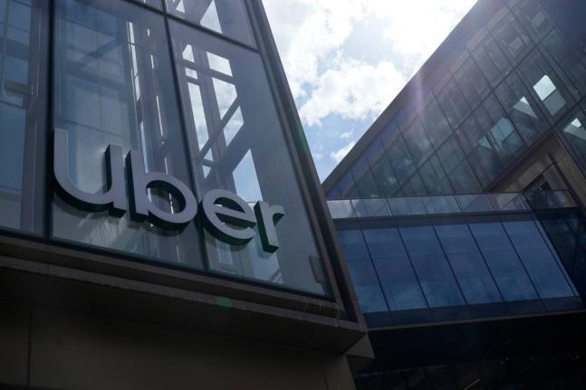 FILE - An Uber logo is displayed at the company's headquarters in San Francisco on Sept. 12, 2022. (AP Photo/Jeff Chiu, File)