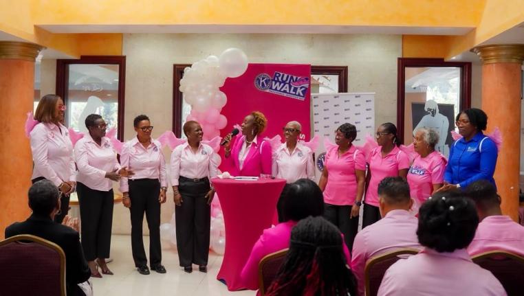 Nadine Spence (centre) the chairperson Kiwanis Club of Providence Montego Bay Breast Cancer Awareness 5K Walk/Run and Wheelchair events,  addresses the audience during the media launch at Grand-A-View Restaurant and Event Place on Thursday, August 20, 2026