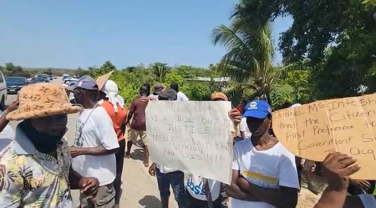 Residents of Cooper’s Pen in Trelawny staging a demonstration on August 22, 2026.