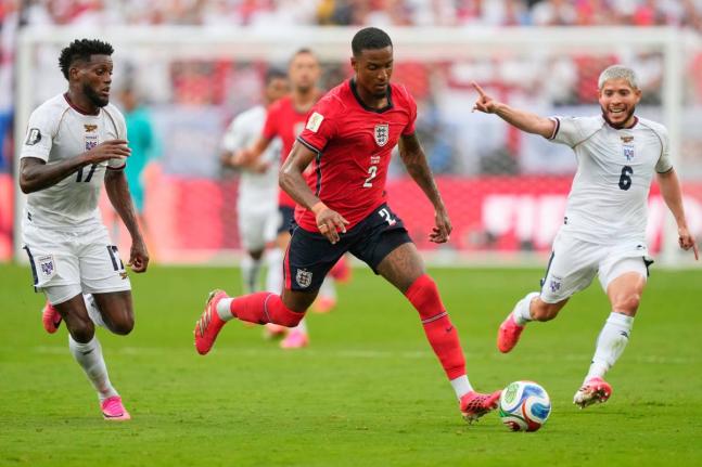 AP 
England’s Ezri Konsa (centre) controls the ball between Panama’s Jose Fajardo (left) and Panama’s Cristian Martinez during the World Cup Group L football match in East Rutherford, New Jersey, on June 27