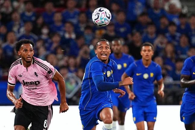 AP 
Joao Pedro of Chelsea (centre) runs for the ball near Lloyd Kelly of Juventus (left) during a pre-season friendly football match for the Hong Kong Football Festival in Hong Kong on Wednesday, August 5.