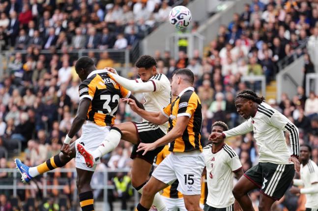 AP 
Manchester United’s Matheus Cunha, (second right) heads the ball during the English Premier League football match against Hull City in Kingston upon Hull, England, yesterday. 